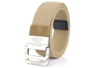 Macro detail of khaki nylon tactical belt with double ring buckle and engraved metal finish