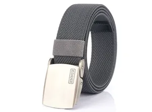 Macro detail of dark grey woven canvas belt showing brushed zinc alloy buckle texture