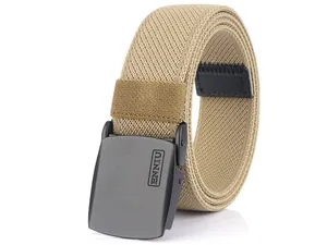 Macro detail of khaki elastic tactical belt showing the ENNIU logo on matte grey buckle