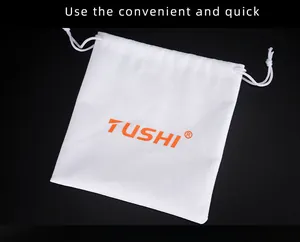 Minimalist white drawstring pouch with orange TUSHI logo and woven cord detail
