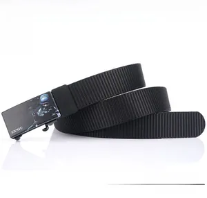 Detail of a thick black nylon tactical belt with a quick-release buckle and military logo