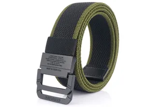 Detail of army green canvas belt with matte metal double-ring buckle and textured weave