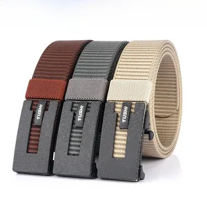 Detailed view of woven nylon belts in brown, grey and beige with matte automatic buckles