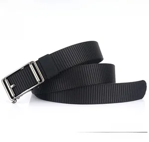 Detail of durable black nylon strap texture and sleek silver metal buckle for men