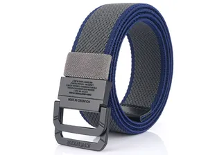 Detail of canvas woven elastic belt with matte black buckle and engraved texture