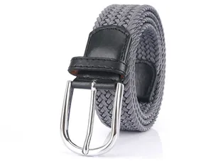 Close-up of grey elastic woven belt with silver pin buckle and black leather detail
