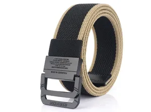 Close-up of tactical canvas belt buckle with dual-ring closure and engraved text