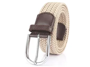 Detailed close-up of khaki elastic braided belt with silver pin buckle and leather trim
