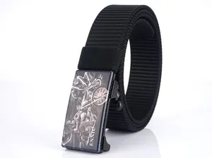 Detailed close-up of a black nylon tactical belt with a motorcycle motif buckle