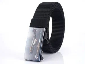 Macro detail of military fighter jet print on metal buckle with tactical nylon web belt