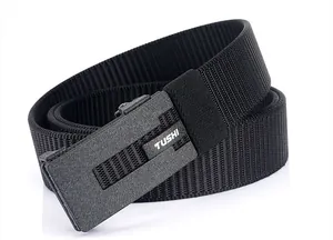 Close-up of black nylon tactical belt with matte automatic buckle and TUSHI logo
