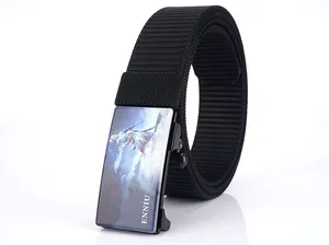 Close-up of black nylon tactical belt featuring a metal sliding buckle with graphic art