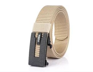 Detail of khaki nylon belt strap and black matte automatic buckle with TUSHI logo