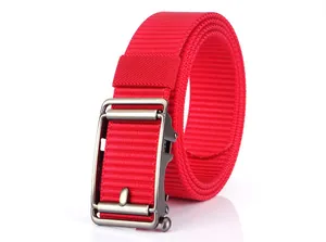 Detail of red nylon belt showing textured woven strap and matte metal automatic buckle