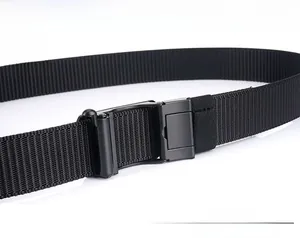 Detail of black nylon woven belt featuring a plastic quick-release buckle and adjustable length