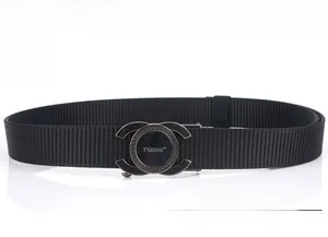 Detail of a tactical black nylon belt with a heavy-duty metal automatic buckle close-up
