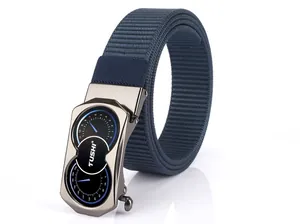 Detail of navy nylon belt with gun-grey automatic buckle featuring blue dial elements