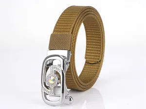 Close-up of khaki woven nylon belt with luxury silver buckle inlaid with crystal rhinestones