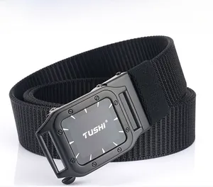 Detail view of a black nylon tactical belt buckle with matte metal finish and engraved logo