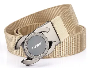 Detail of khaki nylon belt with gunmetal alloy buckle and Greek fret pattern finish