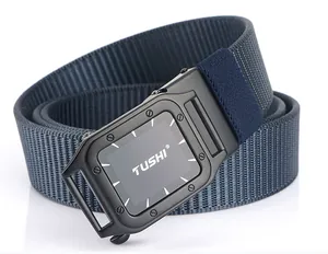 Detail of dark blue nylon belt featuring a matte black tactical alloy buckle with TUSHI logo