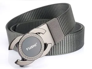 Close-up of alloy automatic buckle with Greek pattern on gray nylon belt strap