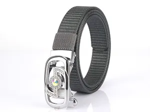 Detailed view of dark grey woven belt with sparkling rhinestone inlaid metal buckle
