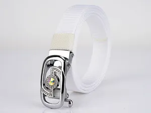 Detail of white braided nylon belt with luxury silver buckle and sparkling rhinestones