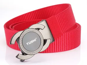 Detail of red nylon belt band texture and gunmetal automatic buckle with TUSHI logo