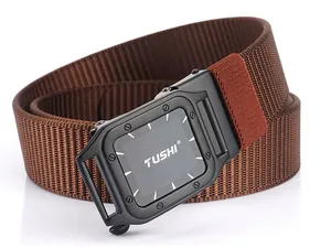 Close-up of brown nylon tactical belt with matte black TUSHI logo buckle and woven texture