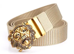 Detailed close-up of golden lion head buckle on khaki nylon tactical belt for men