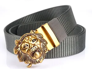 Detail of grey nylon tactical belt featuring a 3D gold lion head automatic metal buckle
