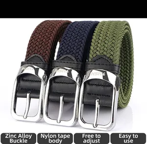 Detail of woven elastic belts in brown, navy, and army green with zinc alloy buckles