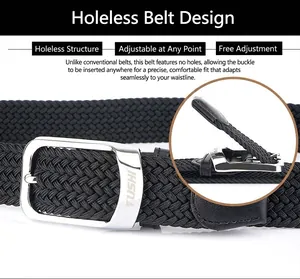 Detail of black woven elastic belt with silver metal buckle and engraved TUSHI logo