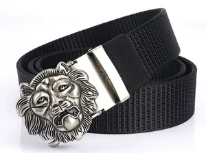 Detailed close-up of a 3D lion head metal buckle on a black nylon woven tactical belt