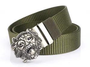 Detailed view of silver lion relief buckle on military green tactical nylon canvas belt