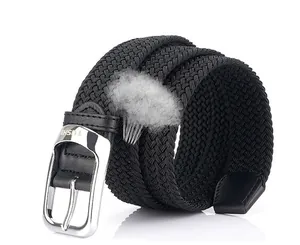 Detail of breathable braided elastic belt with silver metal buckle and leather trim