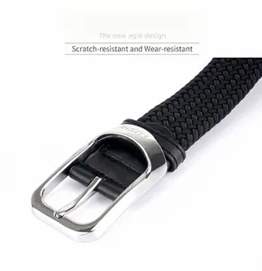 Close-up of elastic woven belt featuring a silver zinc alloy pin buckle with TUSHI logo
