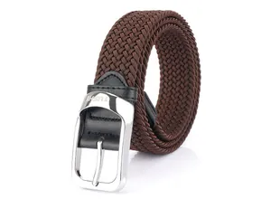 Close-up of brown braided elastic belt with silver metal buckle and TUSHI engraving