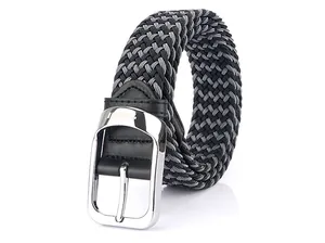 Close-up of black and grey woven elastic belt with silver metal buckle and leather detail