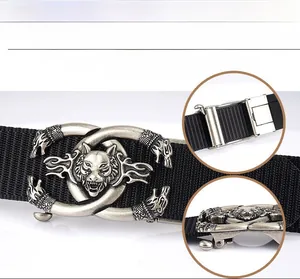 Detail of tactical nylon belt with wolf head buckle and holeless adjustable strap