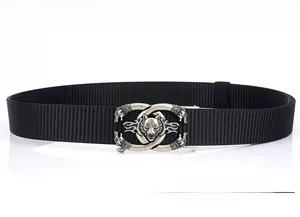 Detail of a tactical nylon belt with a zinc alloy automatic buckle featuring a wolf head