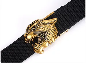 Detailed close-up of a tactical nylon belt with a golden tiger head relief alloy buckle