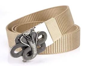 Close-up of khaki nylon tactical belt with embossed cobra motif on silver buckle