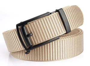 Close-up of khaki nylon woven belt featuring a minimalist black matte automatic buckle