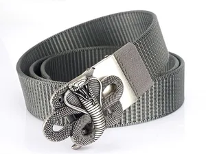 Detail of grey nylon belt featuring a vintage silver 3D cobra-shaped alloy buckle