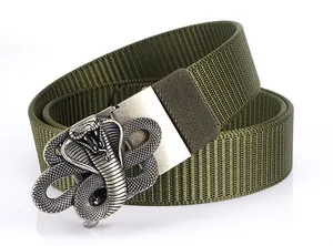 Detail of army green nylon tactical belt with vintage cobra embossed metal buckle
