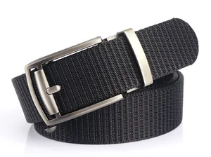 Macro detail of high-density black nylon weave texture and matte metal buckle