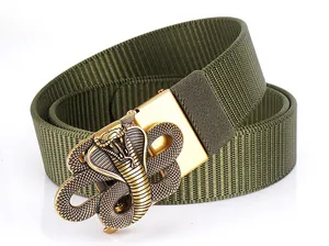 Close-up of army green tactical nylon belt featuring a detailed gold cobra metal buckle