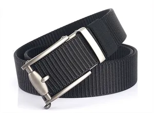 Detail of black nylon woven belt with matte brushed alloy automatic buckle close-up